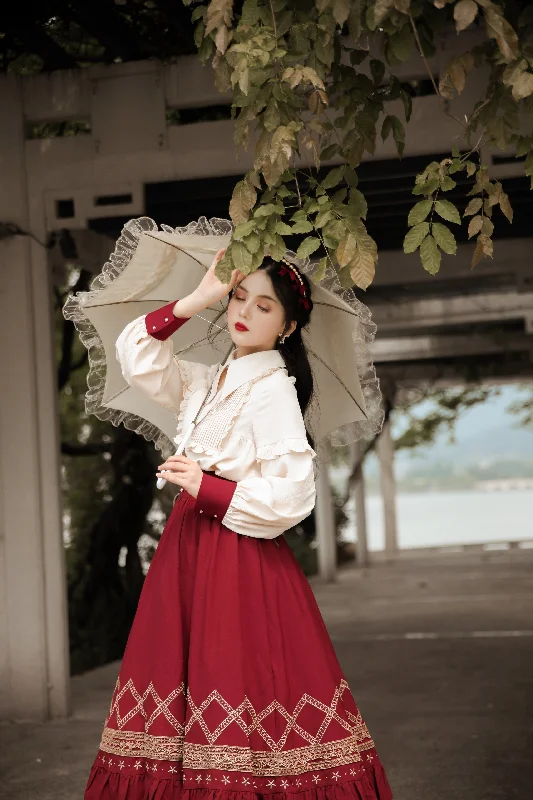 blouse with red cuffs